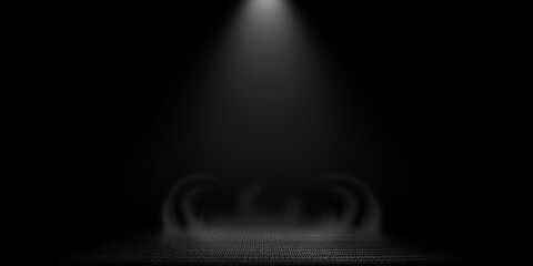 Obraz premium featuring a central overhead spotlight beam reflecting onto a textured floor surface