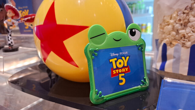 Disney Pixar Toy Story promotional display featuring iconic luxo ball and cute frog themed card holder on June 18, 2026 in Bangkok, Thailand
