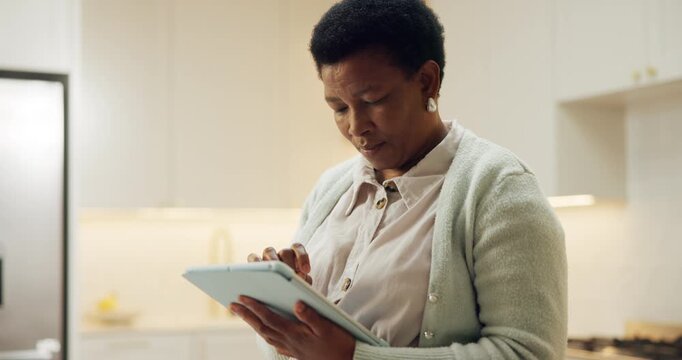 Tablet, scroll and reading with black woman in home for streaming service, movie search or ebook app. Online film platform, subscription and typing with mature person for connection and social media