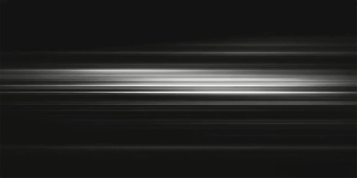 Abstract motion blur effect of bright light streaks across a dark background, creating a sense of speed and energy.