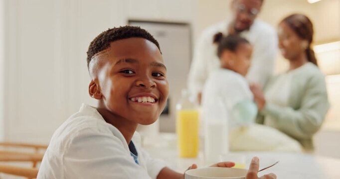 Breakfast, face and smile of black child in kitchen of family home with parents for morning routine. Eating, food and start with happy boy in apartment for diet, nutrition or relationship security