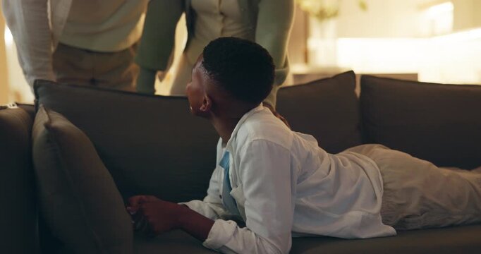 Night, phone and sneaky with black child on sofa in home living room to hide from parents. Late, screen time and social media with discreet boy in apartment for stealthy browsing on mobile app