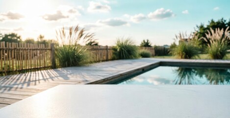Fototapeta premium Modern Outdoor Pool Deck with Wooden Fencing and Greenery for Lifestyle Design