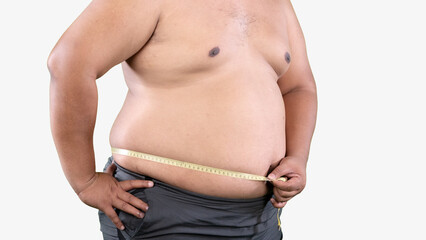 Naklejka premium Close-up of Overweight Man Measuring His Big Belly, Weight Loss Concept