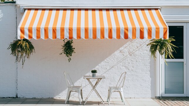 Cafe exterior with inviting orange striped awning offering shade, providing charming urban outdoor dining and relaxation