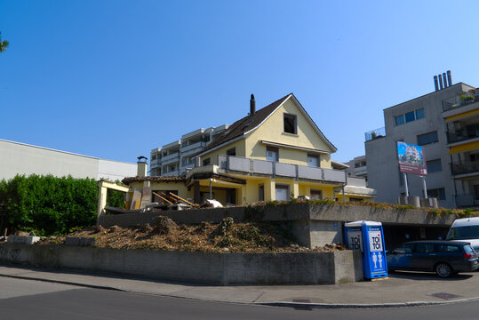 Deconstruction site with partially wrecked yellow apartment building at Swiss city of Z&uuml;rich. Photo taken June 24th, 2026, Zurich Seebach, Switzerland.