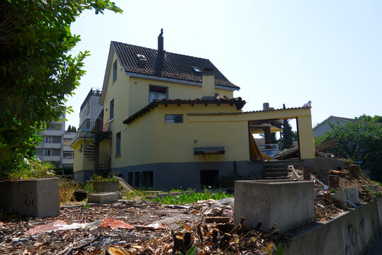 Deconstruction site with partially wrecked yellow apartment building at Swiss city of Z&uuml;rich. Photo taken June 24th, 2026, Zurich Seebach, Switzerland.