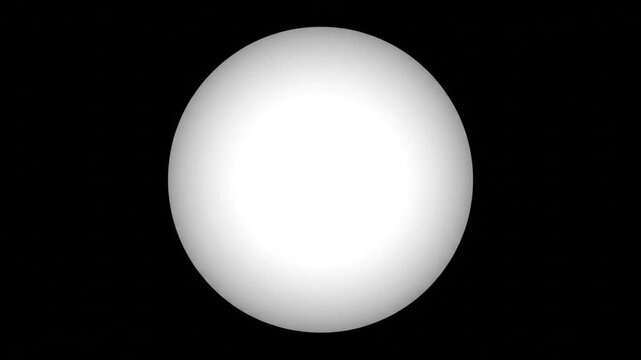 Minimalist white circle centered on solid black background. Luminous white sphere with soft gradient shading, creating a 3D effect. Symmetrical geometric shape on dark void backdrop.