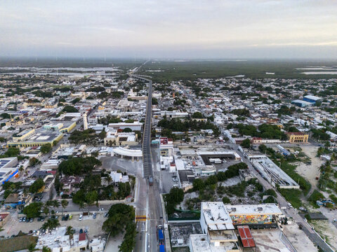Aerial view of Playa Puerto Progreso showing the coastal town layout, urban streets, and surrounding landscape in Progreso, Yucatan, Mexico.