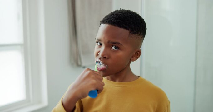 Dental, brushing teeth and face with black child in bathroom for toothbrush, cleaning and morning. Self care, oral hygiene and gum health with kid in home for plaque prevention, mouth and wellness