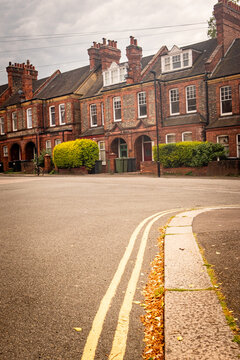 LONDON - red brick terraced houses on residential street in South West London