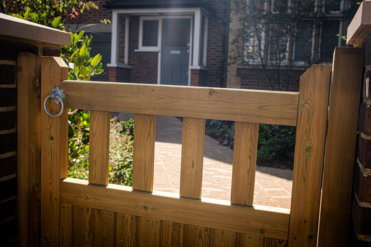 LONDON - wooden garden gate leading to residential house