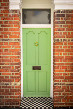 LONDON - green door on red brick period house