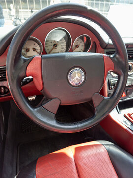 TAVERNES BLANQUES, SPAIN - JUNE 14, 2026.Close view of vintage center console with carbon fiber trim and manual gear shifter in retro Mercedes Benz SLK sports car
