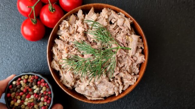 Fish, canned tuna chunks in brine for sandwiches and salads. Canned tuna as a food background for your design