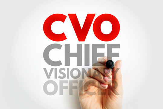 CVO Chief Visionary Officer text with hand holding a marker. Business leadership and innovation executive title abbreviation on clean white background concept