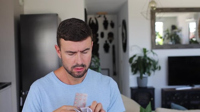 Man reading the leaflet of his new medication 