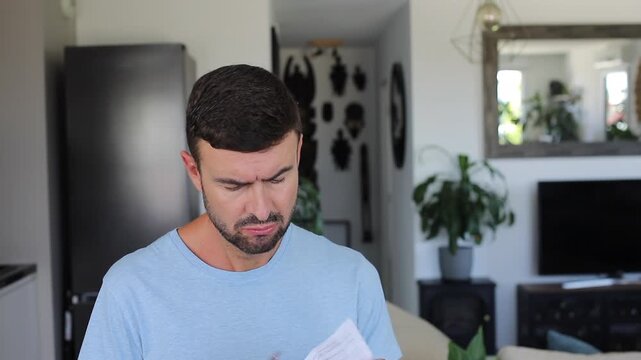 Man reading the leaflet of his new medication 