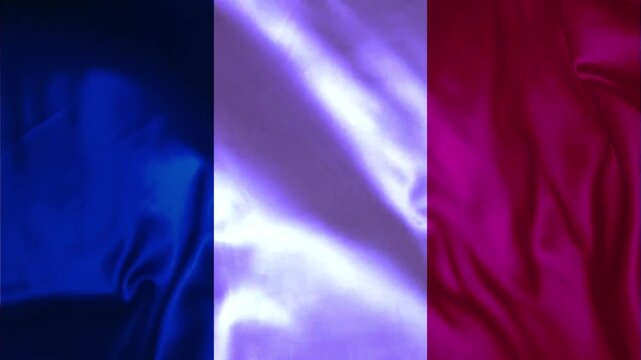 Close up of a flowing satin French flag with vibrant blue, white, and magenta colors creating a luxurious texture
