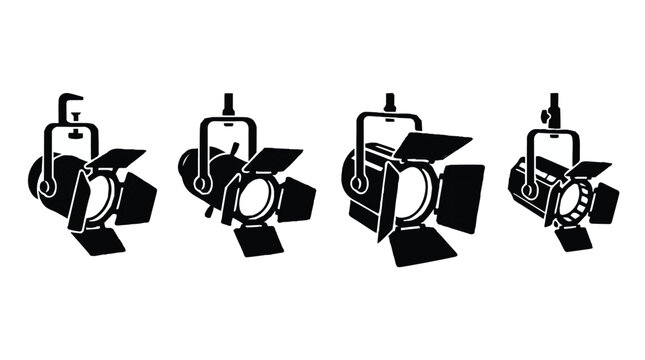 Four studio strobe lights with reflectors in different positions