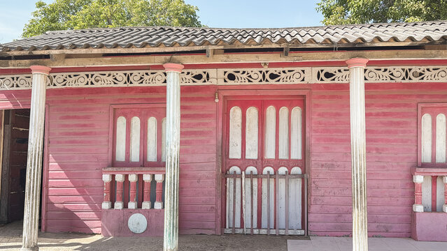 Baru colombia pink wooden facade caribbean house