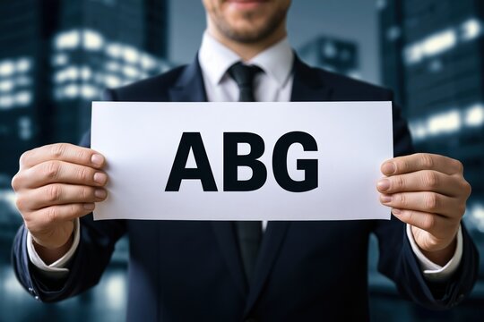 Corporate businessman holding a white sign with abg
