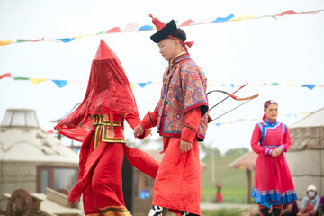 Obraz premium Traditional Mongolian wedding ceremony on the grassland