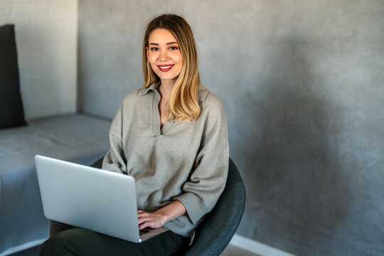 Technology remote job, lifestyle concept. Success woman with laptop computer working at home office