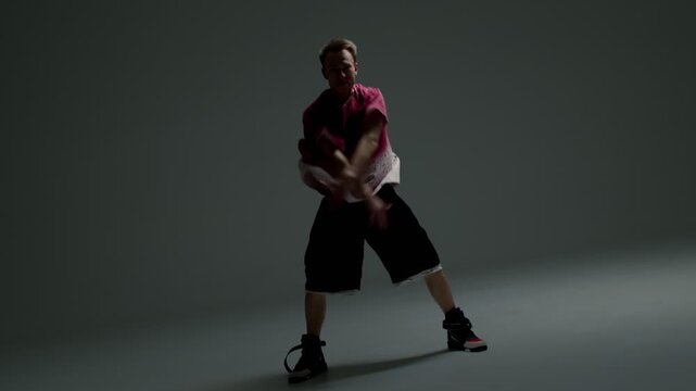 Contemporary dance crouch pose with wide extended arms