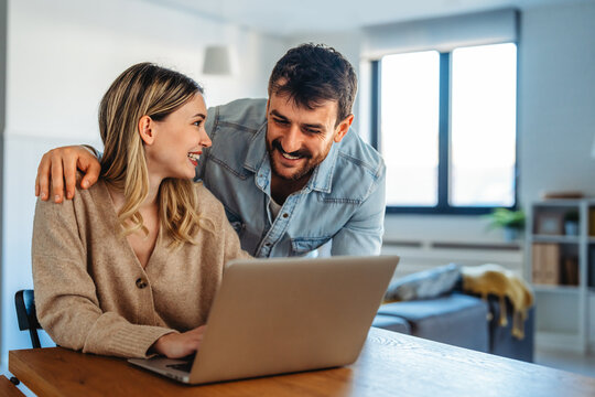 Portrait of success business people working together in home office. Couple teamwork startup concept