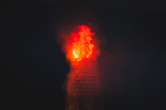 Slinningsbalet 2026 burns brightly beside the sea in Alesund, Norway