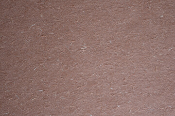 Fototapeta premium Brown Handmade Paper Texture Background with Visible Natural Fibers