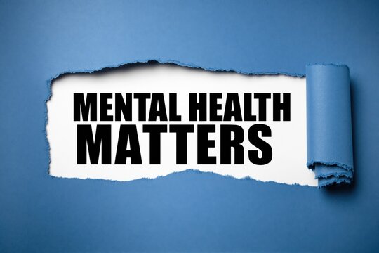 Mental health matters words on white background under torn blue paper