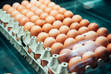 Obraz premium Chicken eggs on sale at the market.
