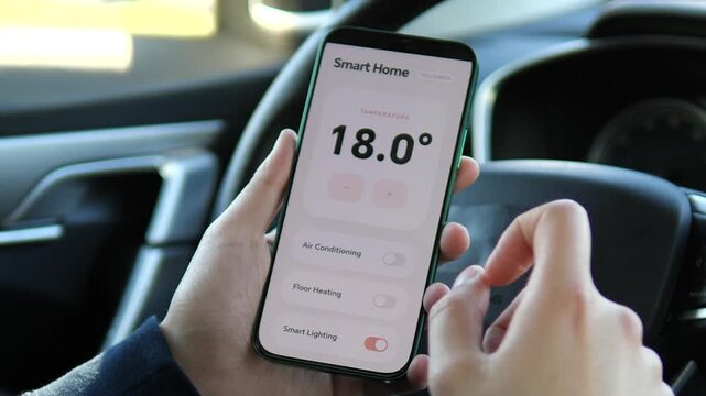 Hand managing a smart home dashboard where Floor Heating is turned off while Air Conditioning remains active. The interface allows for selective system control. Perfect for seasonal energy management