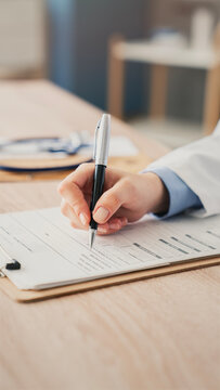 Medical doctor completing administrative healthcare records