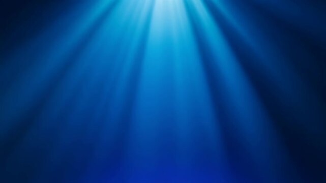 Light Shafts Illuminating a Deep Blue Hole Diving into the Unknown Ocean Depths