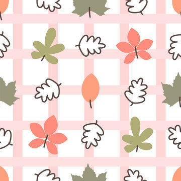 cute hand drawn autumn fall seasonal colorful leaves seamless vector pattern illustration on gingham pink background