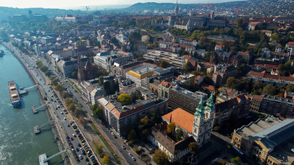 Obraz premium Aerial view around the old town and capitol city Budapest in Hungary beside the Danube river on a sunny late summer day