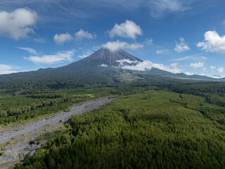 Naklejka premium Majestic sunrise view of Mount Semeru java indonesia landscape photography natural environment serene perspective.
