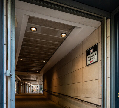 Pinner's Passage in London, a modern walkway it aligns with a historical gate in the walls of the former Austin Friars monastery.