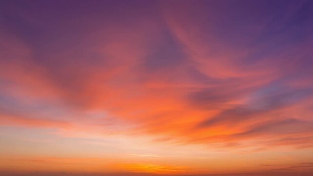 Vibrant Sunset Sky with Layered Clouds and Orange to Purple Gradient, Elegant Cinematic Timelapse Motion Background Full HD