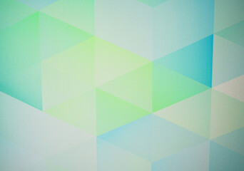 Obraz premium Wallpaper background, texture. Colorful geometric shapes of blue and green arranged in pattern on flat surface of wallpaper. Shapes in shades of blue and green form pattern on flat surface. 