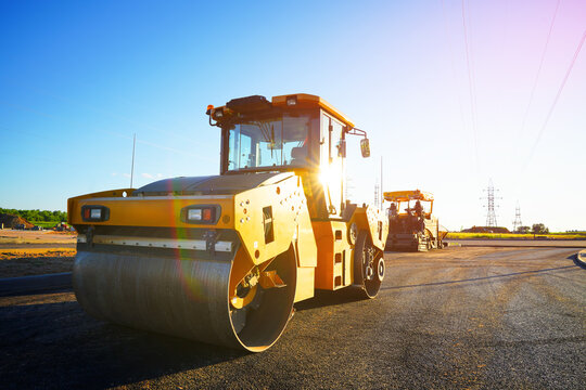 Soil Compactor on compact the road surface during road construction. Road compaction equipment at construction site. Vibration single-cylinder road roller, Vibratory Soil Compactor. Single Drum