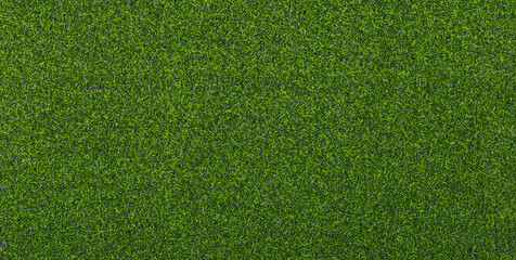 Artificial soccer turf texture with dense green synthetic grass blades in close up view. Sports background for soccer field, training ground, playground, and outdoor design. © natrot