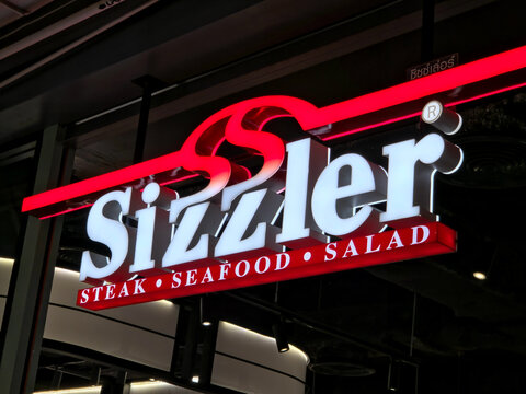 Illuminated Signage of a Sizzler Restaurant on June 21 2026 in Bangkok, Thailand.