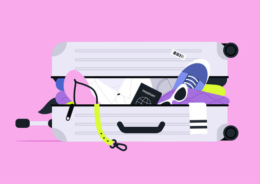 Open suitcase overloaded with clothes and personal belongings, baggage excess