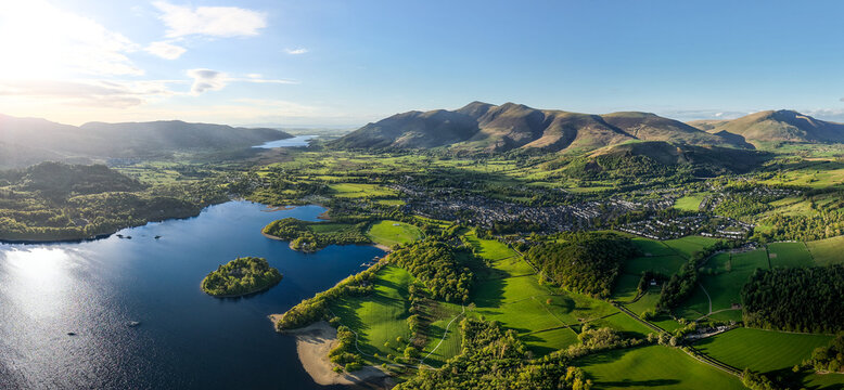 Aerial panoramic landscape of Keswick town and Derwentwater lake in the English Lake District