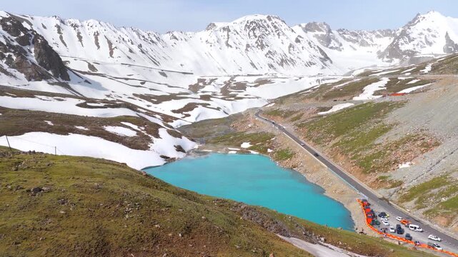 未命名Aerial view of a winding mountain road snaking through high peaks and gorges; the beautiful scenery of the Duku Highway in Xinjiang, China.项目