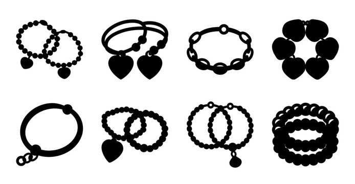 Black jewelry bracelets and necklaces set collection - A stylish assortment of black jewelry including bracelets, necklaces, and rings in a clean, minimalistic design.